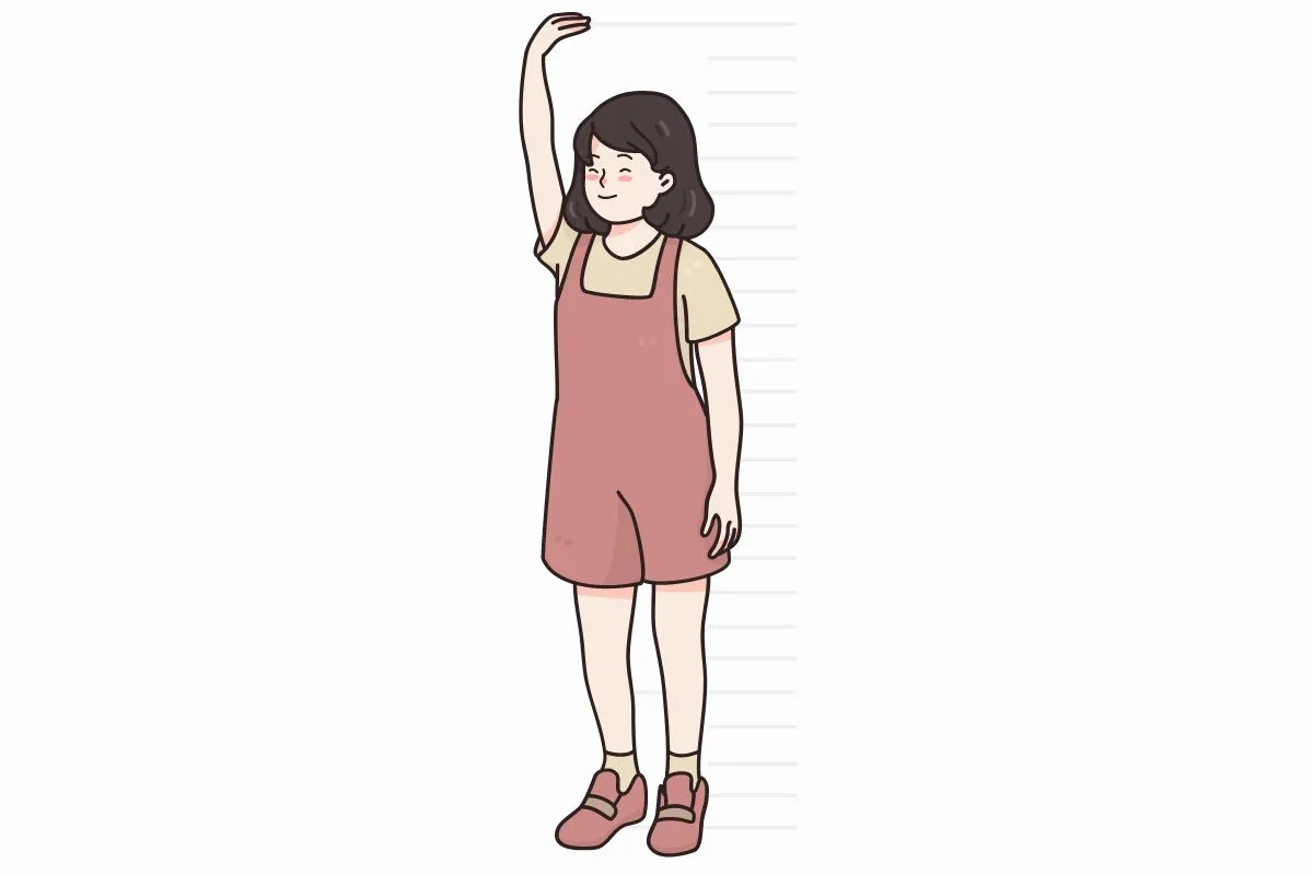 背が伸びたことを喜ぶ女の子のイラスト